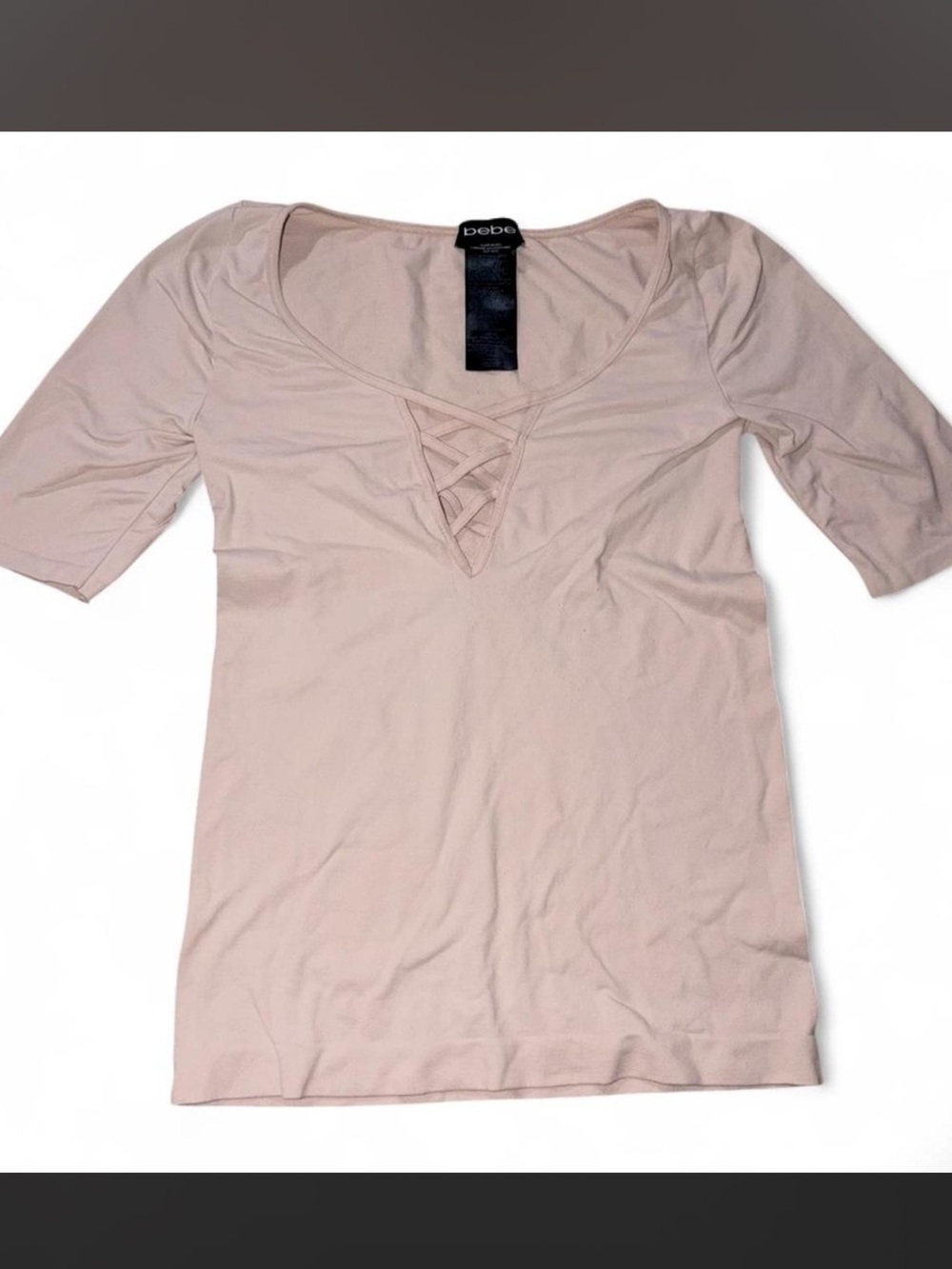 Bebe pink top with criss cross detail